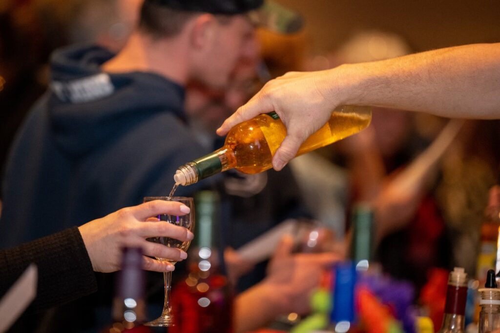 Wine being poured at Wine on the Lake